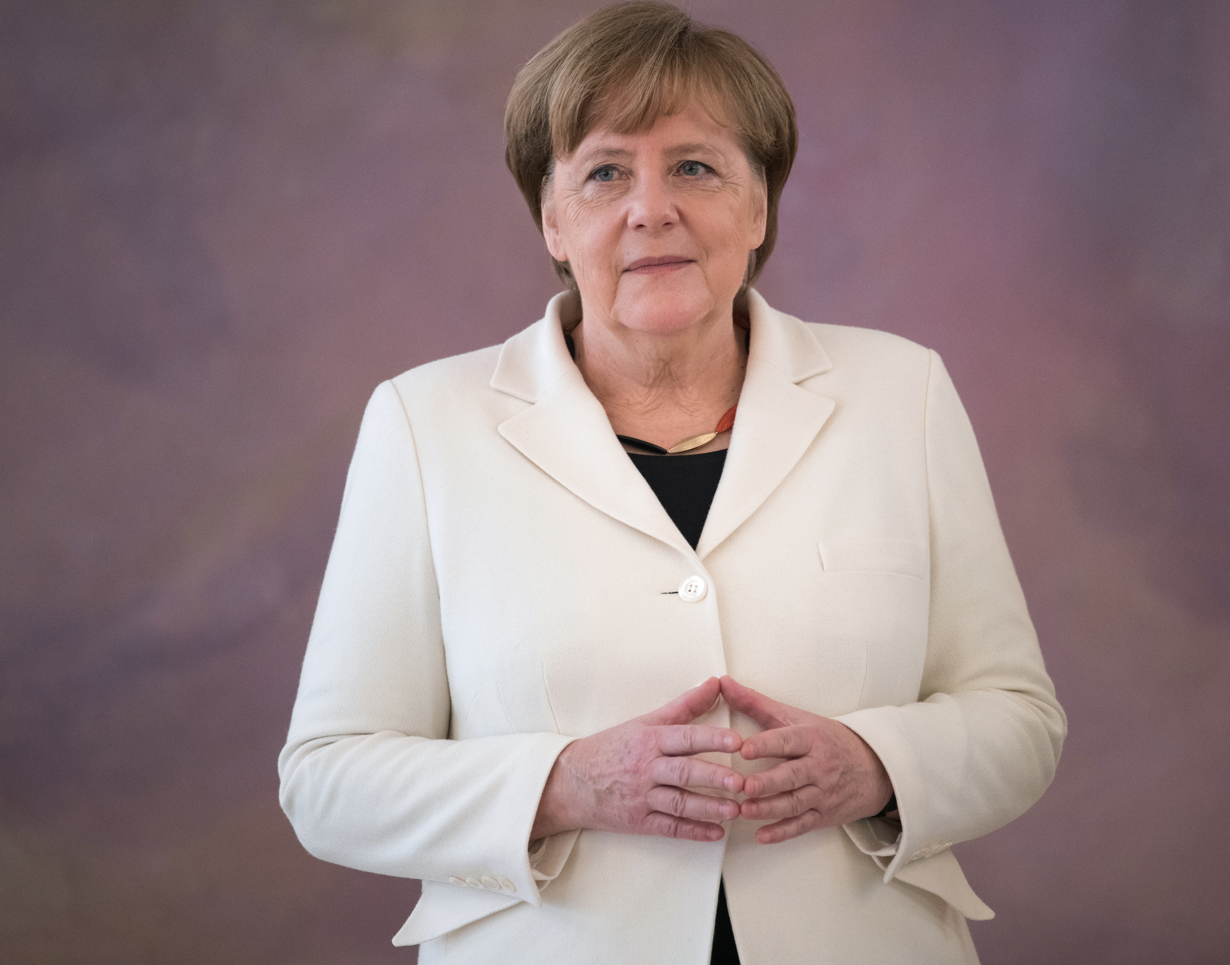 Thủ tướng Đức Angela Merkel tại lễ bổ nhiệm Chính phủ mới ở Phủ Tổng thống Đức, ngày 14/3. (Nguồn: AFP)
