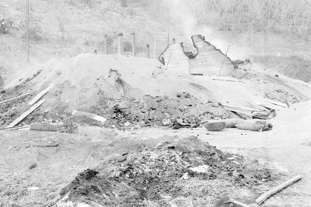Rice warehouse in Ben Den, Lao Cai town, Hoang Lien Son province (now Lao Cai province) was destroyed with explosive by the enemy in their withdrawal. (Photo: VNA)