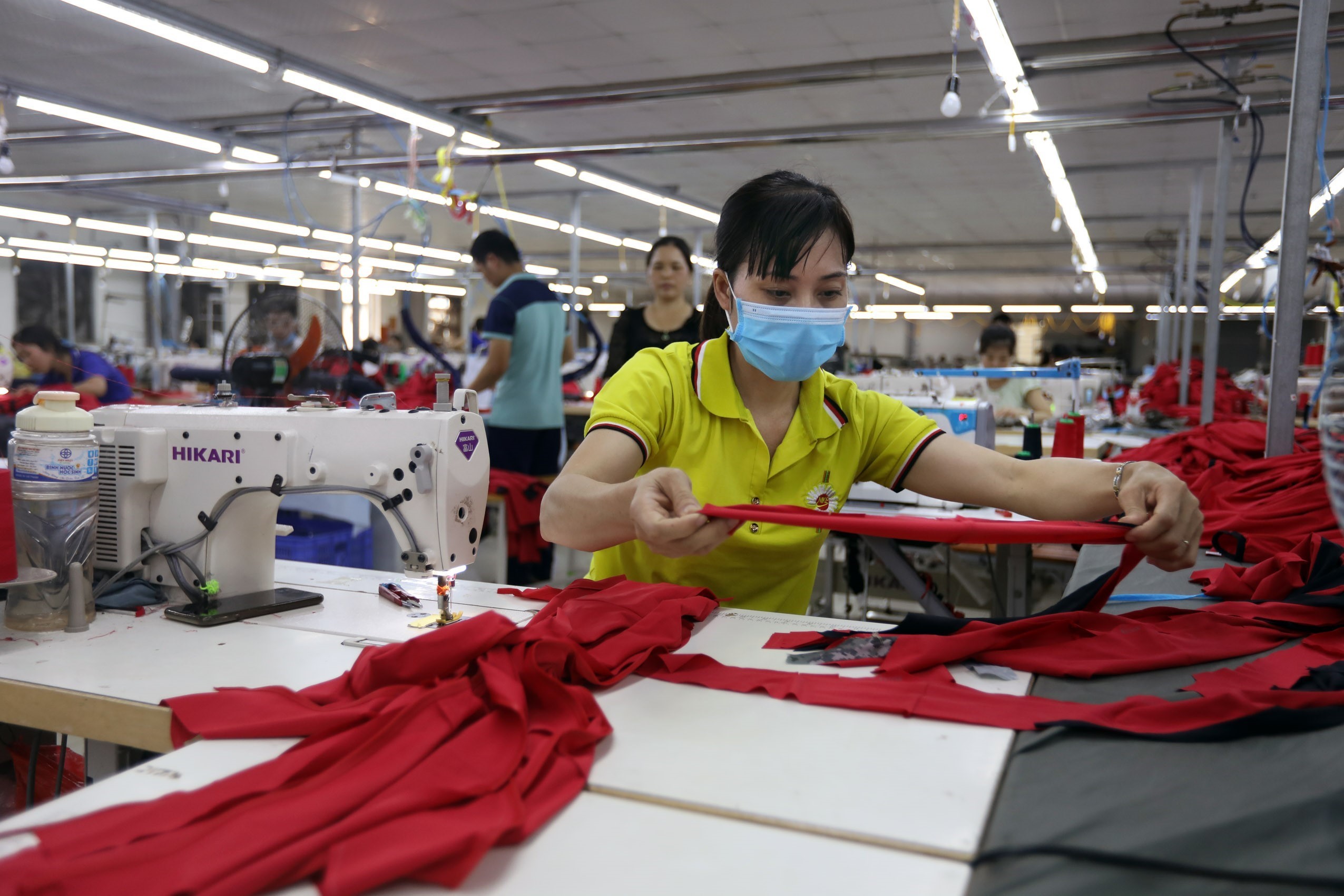 Dây chuyền may xuất khẩu tại Công ty TNHH BT Fashion, tại thị trấn Bích Động, huyện Việt Yên (tỉnh Bắc Giang). (Ảnh: Danh Lam/TTXVN)